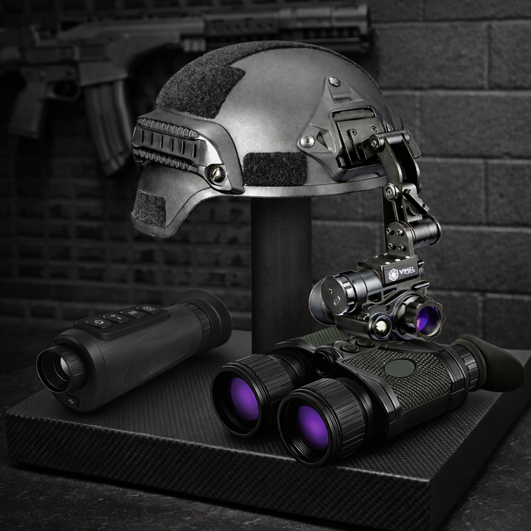 A helmet mounted monocular, binoculars and a thermal device on a dark carbon platform